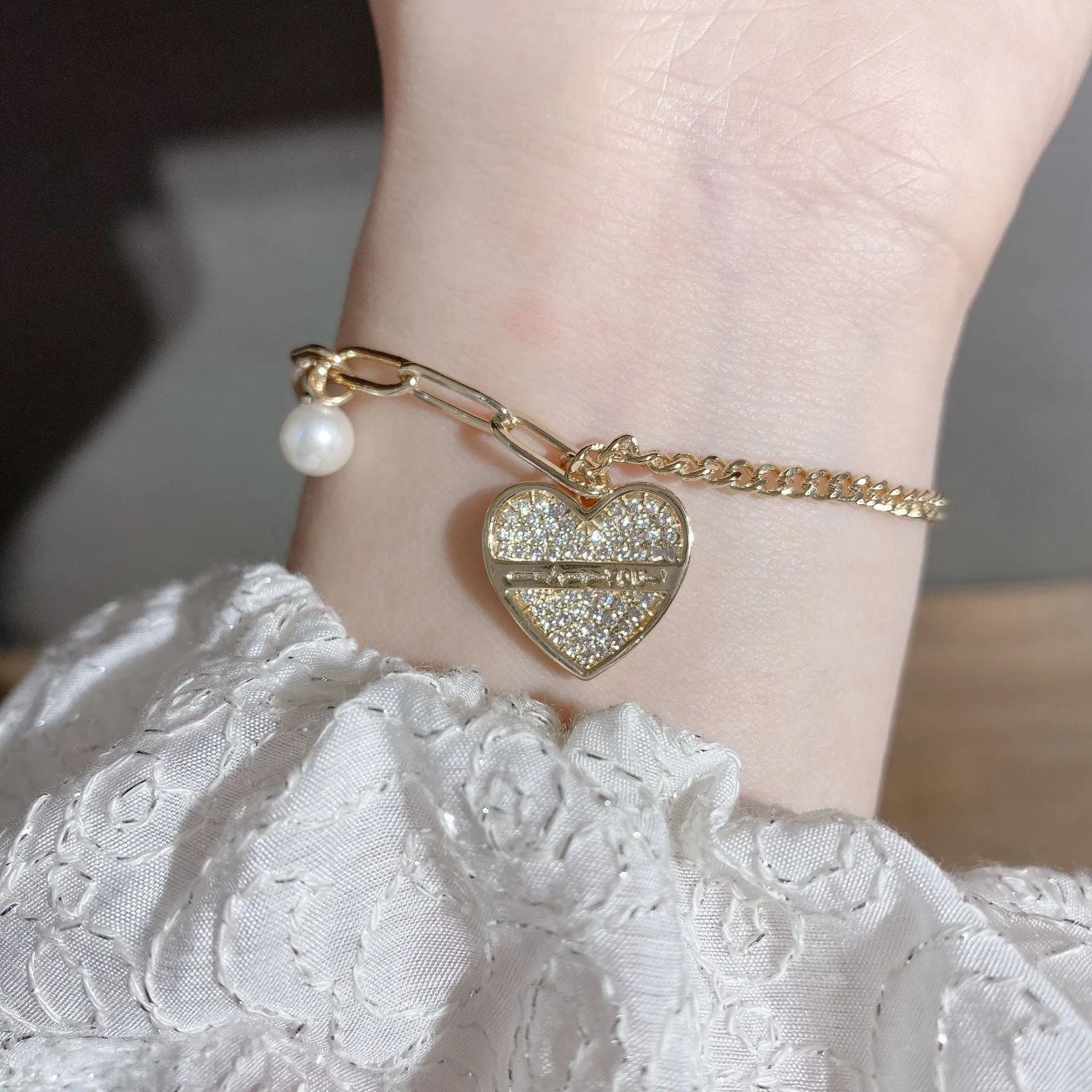 Heart Pendant Asymmetrical Bracelet with Pearl