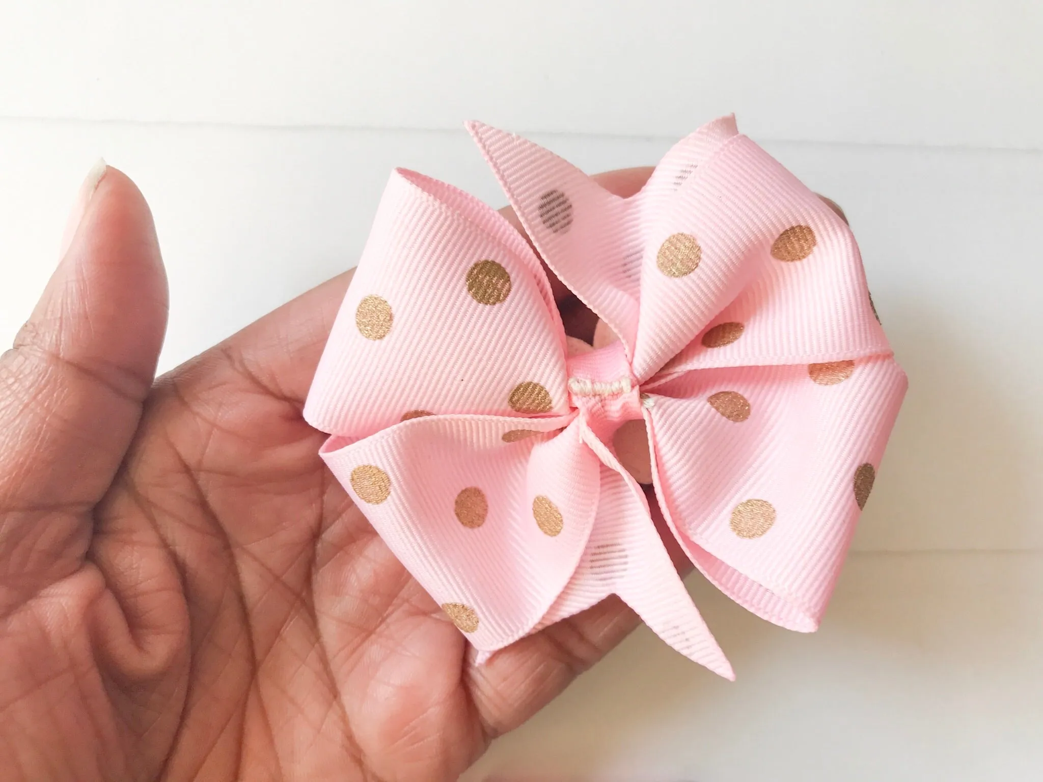 Pink and Gold Polka Dots Mini Pinwheel Hair Bow I The Enchanted Magnolia